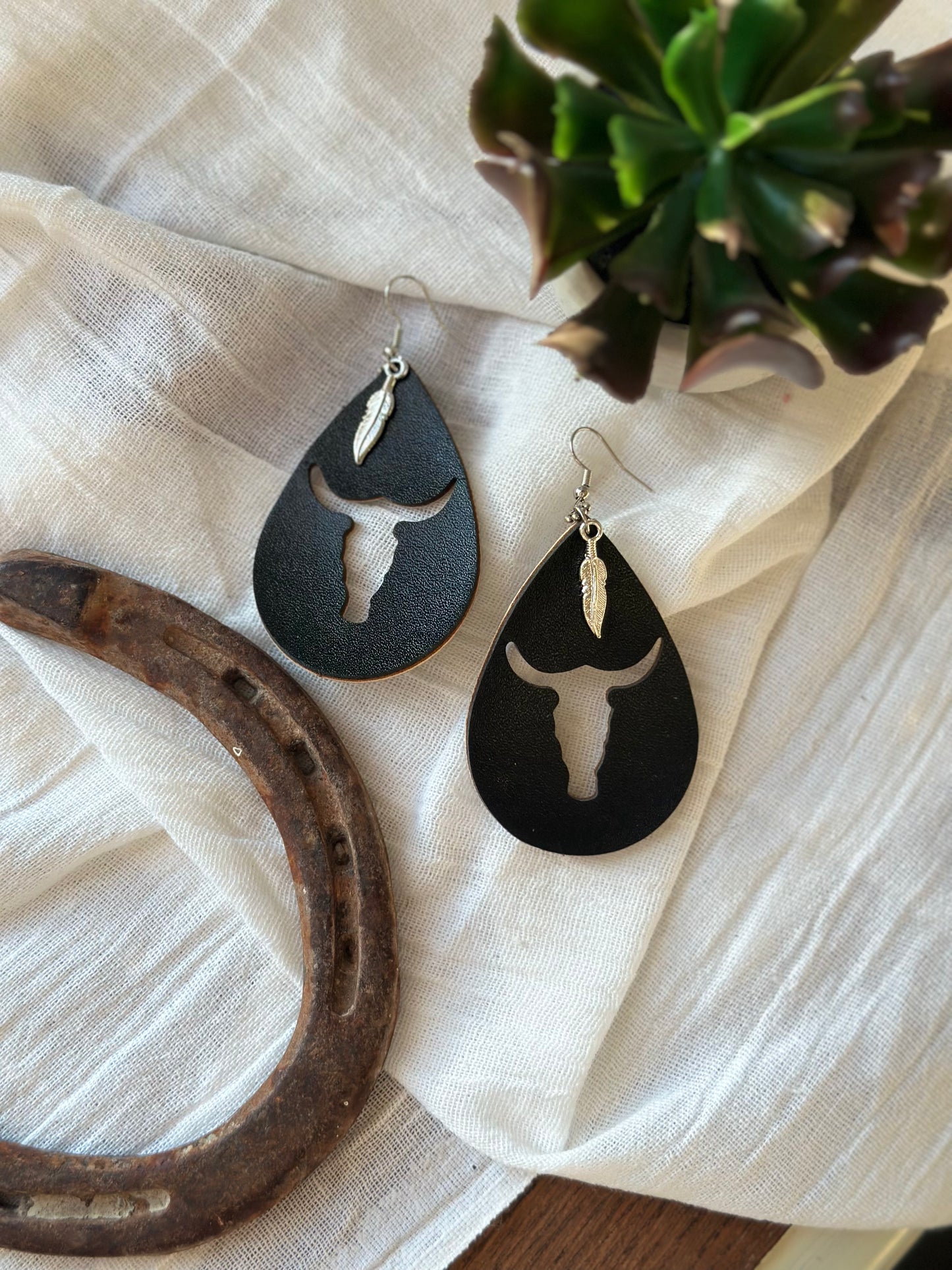 Black Faux Leather Cow Head Cut Out Earrings